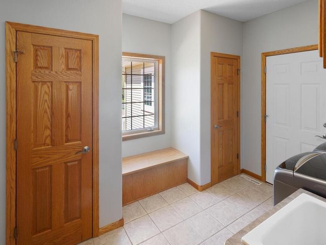 Main Level MudRoom with storage Bench Built In - 25259 Galaxy Ave Wyoming MN 55092 USA-069-044-070-MLS_Size.jpg | Image 47