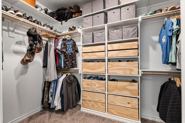 Walk in closet featuring carpet floors | Image 25