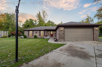 7870 Siding Court, Home with 3 bedrooms, 2 bathrooms and null parking in Grosse Ile Twp MI | Image 1