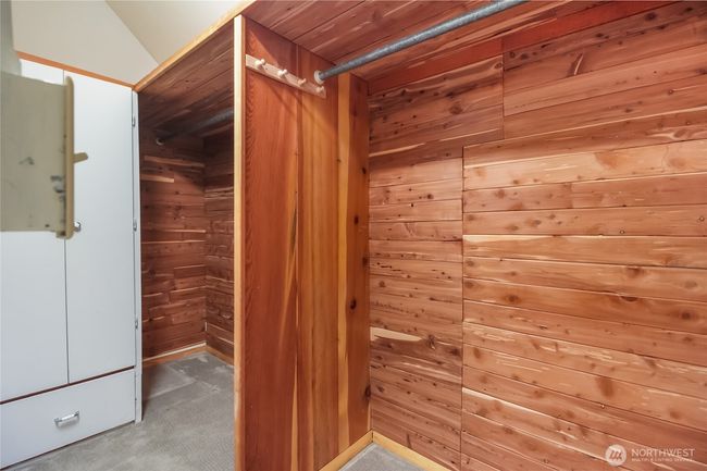 Closet in the first bedroom features cedar-lined organizers. | Image 14