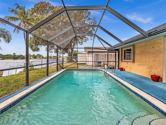 8910 Nw 7 Th Ct, House other with 3 bedrooms, 2 bathrooms and null parking in Pembroke Pines FL | Image 25