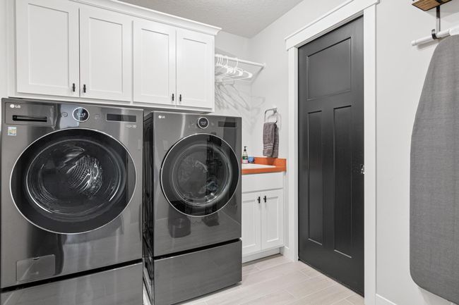 Laundry conveniently on upper level | Image 38