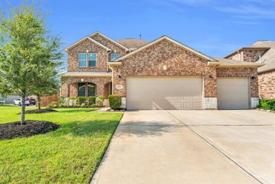 10026 Open Slope Court, House other with 4 bedrooms, 3 bathrooms and null parking in Humble TX | Image 1