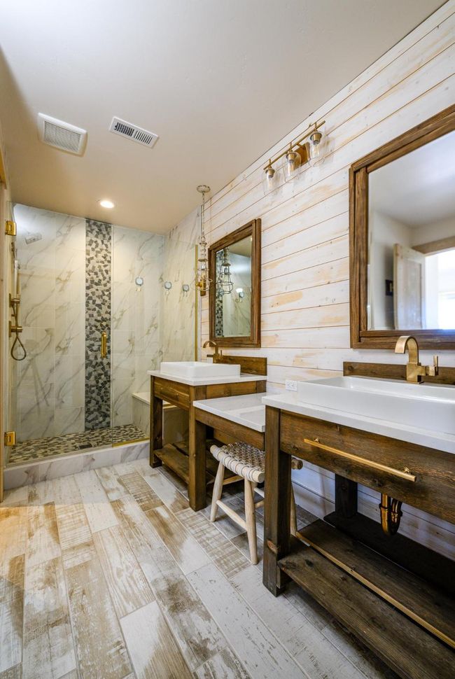 Second en-suite bath with double sinks, a large walk-in shower, and a private toilet room | Image 25