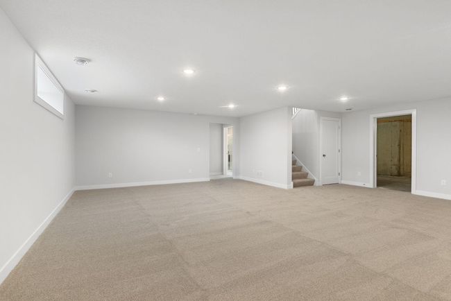 This FINISHED basement is ready to become your next favorite hangout spot, offering ample space for a game room, TV area, or a kids' play zone that everyone will enjoy. | Image 33