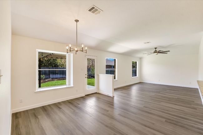View of the breakfast and family room. Note the wonderful natural light. | Image 15