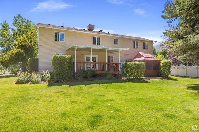 Back of property with a lawn | Image 44