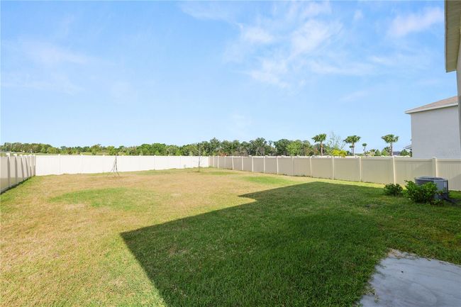 8009 Sail Clover Ln, House other with 4 bedrooms, 3 bathrooms and null parking in ZEPHYRHILLS FL | Image 32