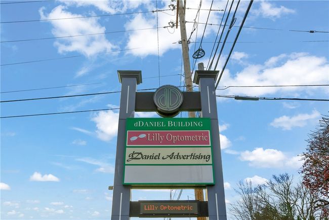 Lighted sign on pylon and digital message board | Image 6