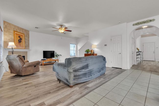 View of living room form viewpoint of the informal dining area | Image 10