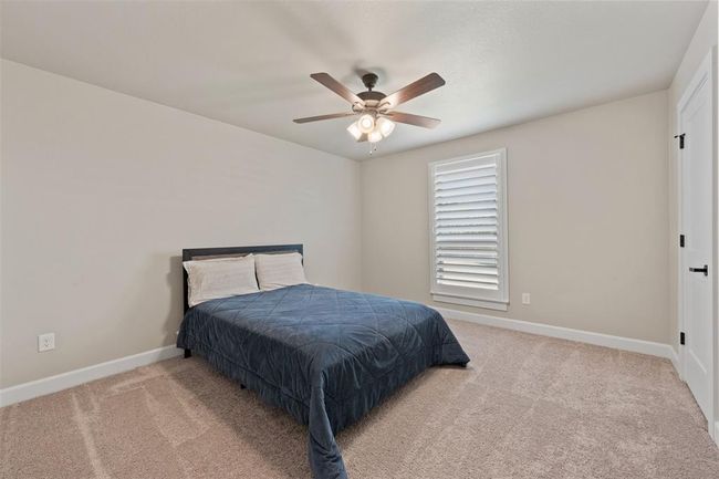 secondary bedroom w/ queen bed | Image 22
