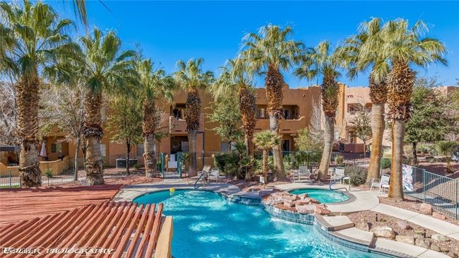 Pool featuring a community hot tub and fence | Image 74
