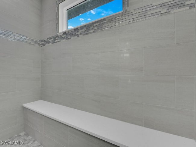 Full bath featuring a tile shower | Image 22
