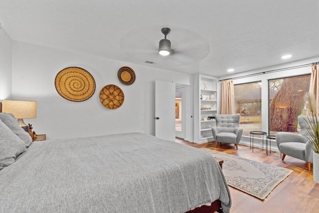 Bedroom with ceiling fan and light hardwood / wood-style flooring | Image 24