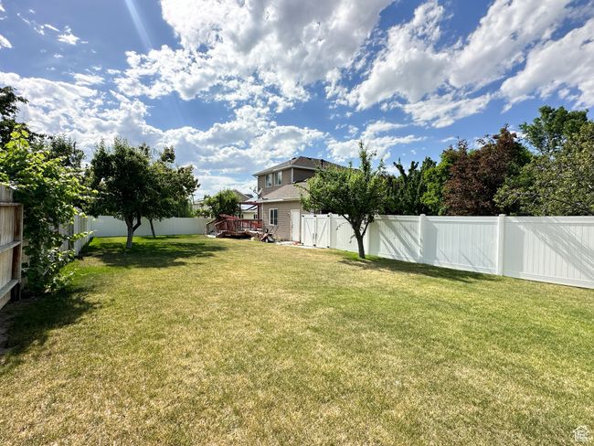 View of yard with a deck | Image 19