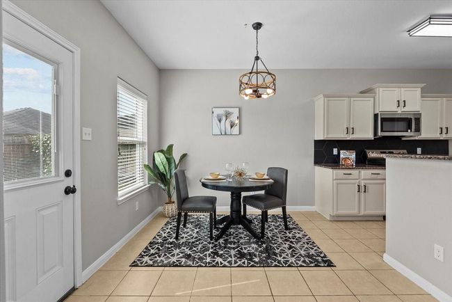The heart of the home, this kitchen is a culinary masterpiece, perfect for creating gourmet meals or simple weeknight dinners. | Image 10