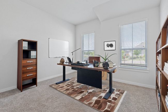 Carpeted office space with a wealth of natural light and baseboards | Image 23