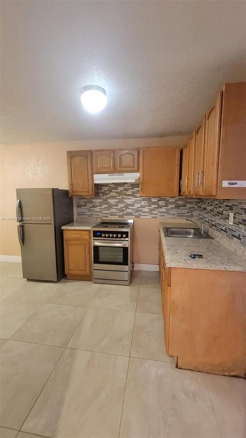 a-5001 Nw 23rd St, Lauderhill, FL, 33313-3429 | Card Image