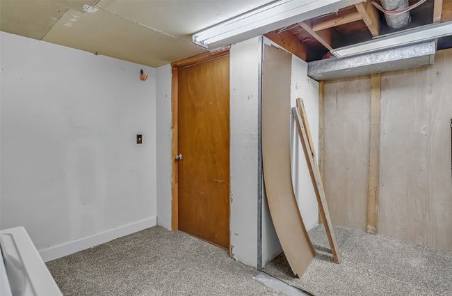 Unfinished below grade area with carpet floors | Image 32