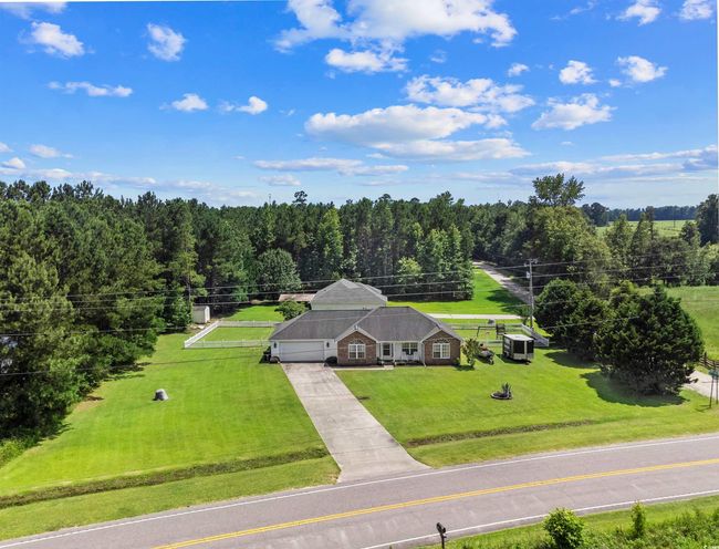 View from above of property with a forest | Image 19