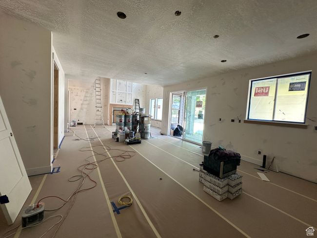 Living room featuring a textured ceiling | Image 5