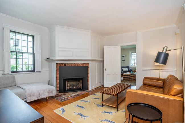 A new energy efficient gas fireplace was recently added to this 3rd fireplace on the first floor. | Image 18