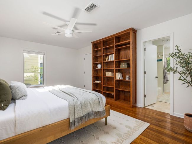 Bedroom featuring wood floors and a ceiling fan | Image 15