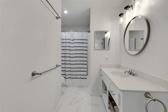 Full bathroom upstairs with tub/shower | Image 19