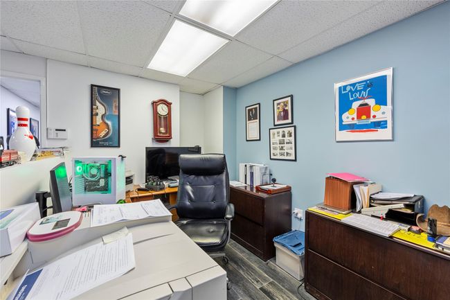 Office area featuring a paneled ceiling | Image 27