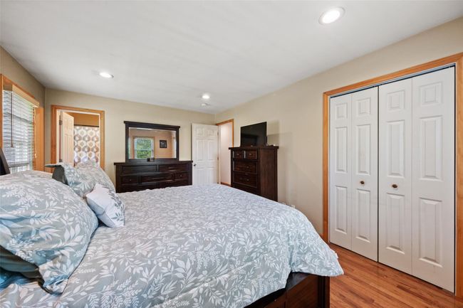 Bedroom with recessed lighting, a closet, and light wood-style flooring | Image 20