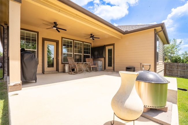 View of patio / terrace featuring a ceiling fan | Image 26