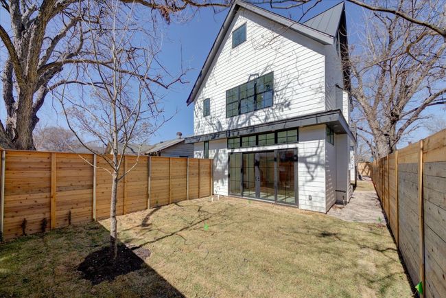 Because the front yard is fully fenced, it's completely private from the street - also a potential spot for a large deck and/or pool. | Image 37