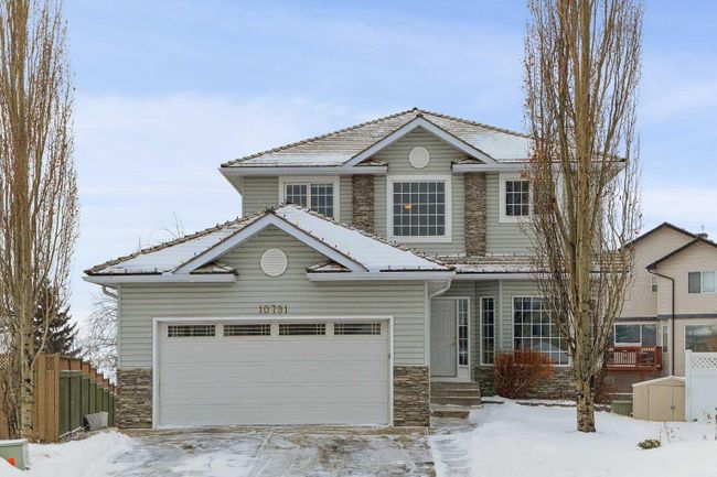 10791 Valley Springs Road Nw, Home with 5 bedrooms, 3 bathrooms and 4 parking in Calgary AB | Image 2