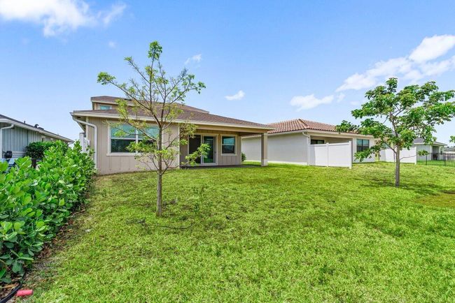 19659 Rugged Trunk Trl, House other with 3 bedrooms, 3 bathrooms and null parking in Loxahatchee FL | Image 34