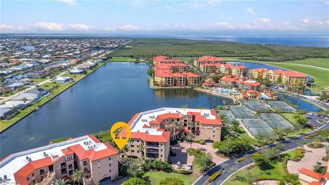 Drone / aerial view of a large body of water and apartment complex | Image 38