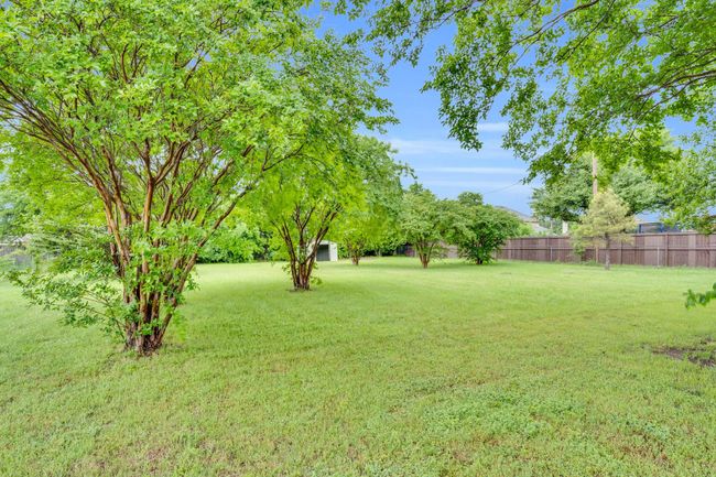 View of yard featuring fence | Image 7