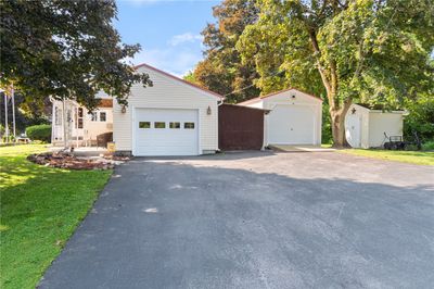 The rear patio and the brand new, HUGE SHED! | Image 2