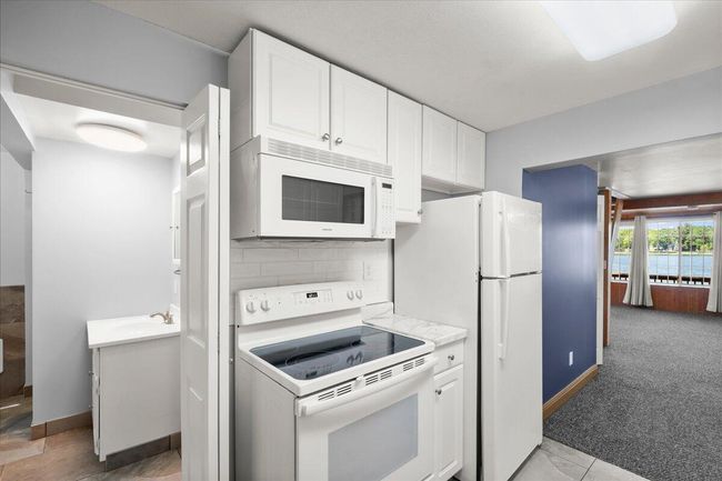 12915 E Englewright Dr, House other with 2 bedrooms, 1 bathrooms and null parking in Sand Lake MI | Image 13