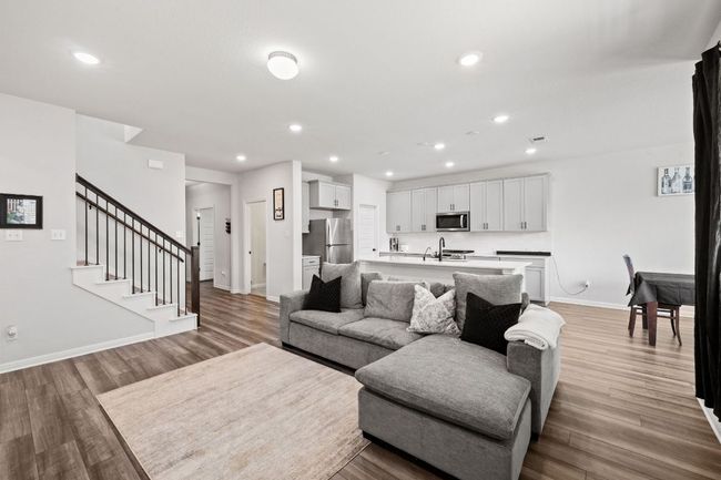 Living area featuring stairs, baseboards, recessed lighting, and light wood-style floors | Image 8