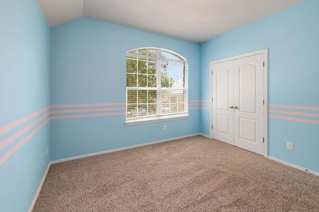 With large windows and generous closet space, these guest bedrooms combine practicality and style, making them perfect for family, friends, or even a private retreat | Image 30