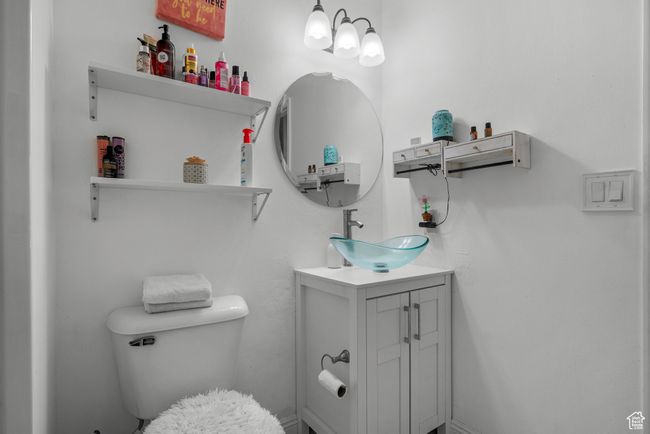 Half bathroom with vanity and toilet | Image 16