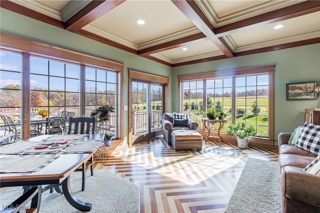 Sunroom with coffered ceiling and beam ceiling | Image 15