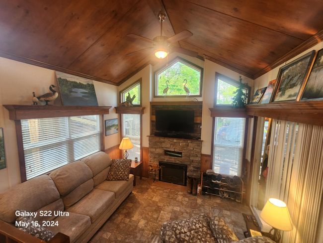 View of living area from loft | Image 16