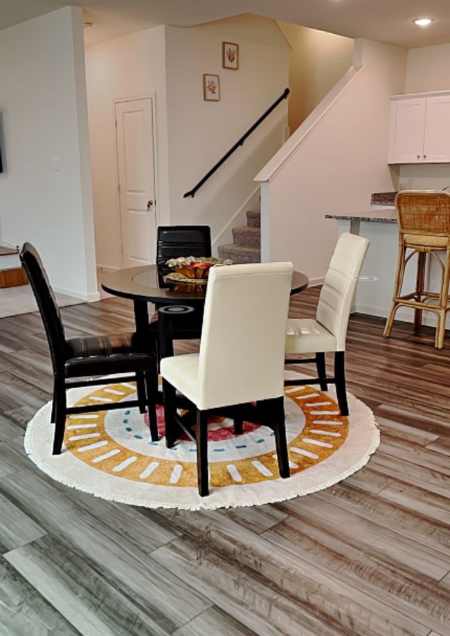 Dining space featuring stairway, wood finished floors, and recessed lighting | Image 6