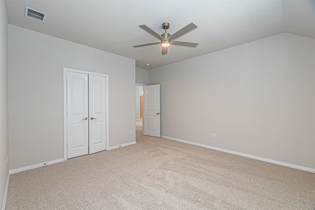 Unfurnished bedroom featuring light carpet, a closet, and a ceiling​​‌​​​​‌​​‌‌​‌‌​​​‌‌​​‌‌​‌​​​​​‌ fan | Image 38