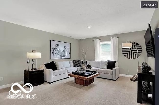 Upstairs carpeted loft area with baseboards | Image 13