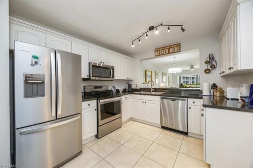 e104-1330 Derbyshire Ct, NAPLES, FL, 34116-3635 | Card Image