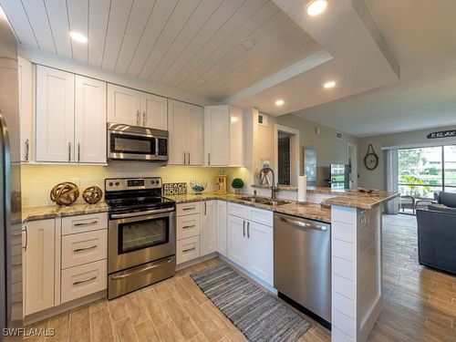 203-900 Misty Pines Cir, NAPLES, FL, 34105-2557 | Card Image
