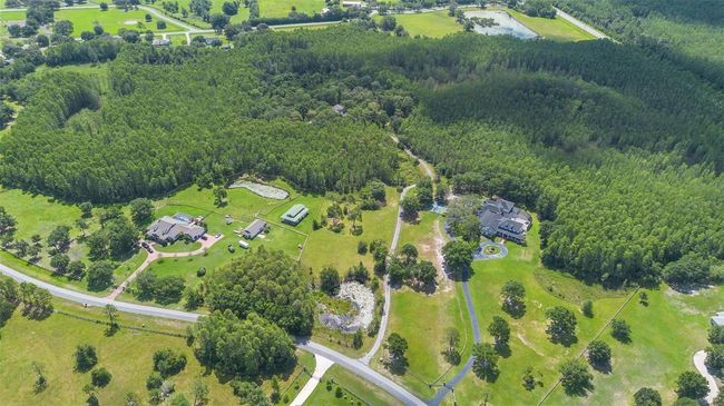 11933 Pasco Trails Blvd, House other with 4 bedrooms, 3 bathrooms and null parking in SPRING HILL FL | Image 50