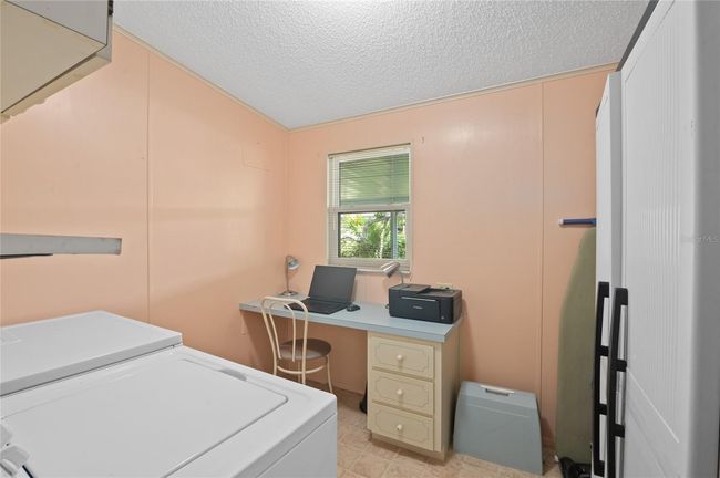 Laundry room and storage area | Image 21